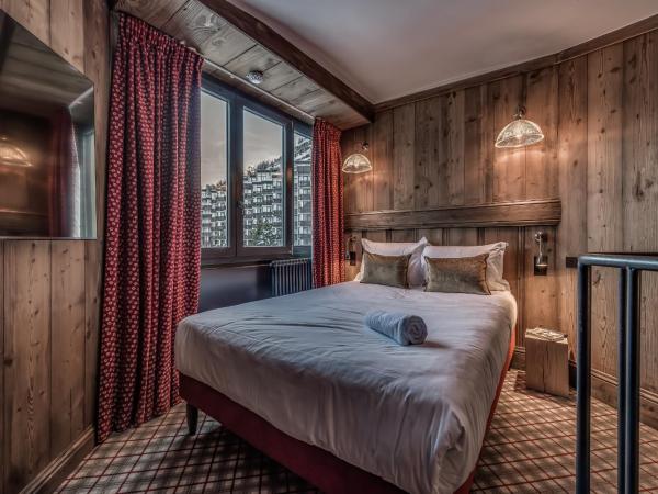 HOTEL LE VAL D'ISERE : photo 8 de la chambre chambre quadruple en duplex