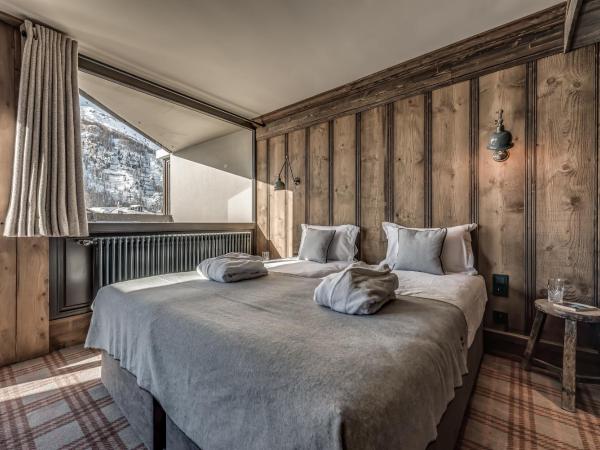 HOTEL LE VAL D'ISERE : photo 6 de la chambre chambre quadruple - vue sur montagnes