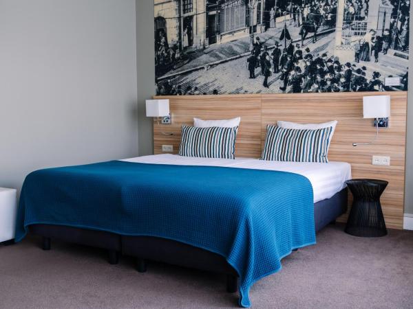 Stadshotel De Klok : photo 1 de la chambre chambre lits jumeaux confort