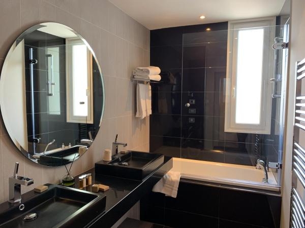 Hôtel Le Canberra : photo 10 de la chambre suite rotonde