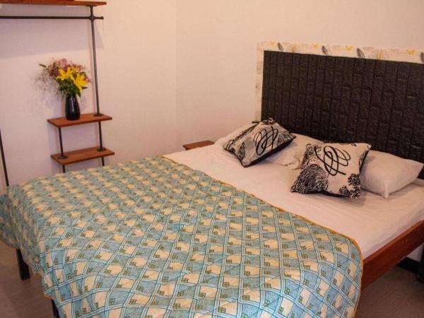 IDEAL SOCIAL Hostel : photo 3 de la chambre chambre double ou lits jumeaux deluxe avec balcon