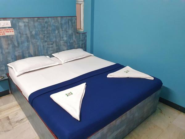 SM MANSION near Harbour & High court : photo 1 de la chambre chambre double standard