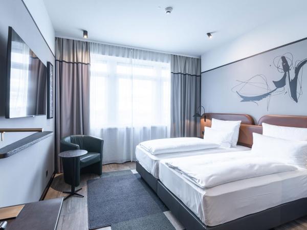 TITANIC Comfort Kurfürstendamm : photo 1 de la chambre chambre standard lit queen-size