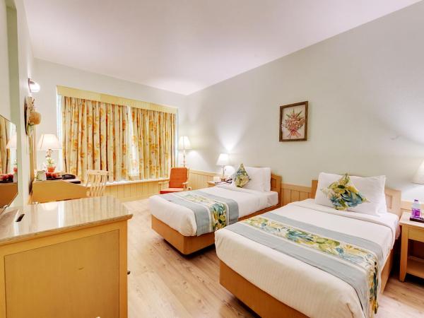 E Square The Fern An Ecotel Hotel Pune : photo 1 de la chambre winter green