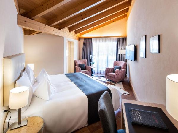 GOLFHOTEL Les Hauts de Gstaad & SPA : photo 1 de la chambre chambre double - chalet golfino