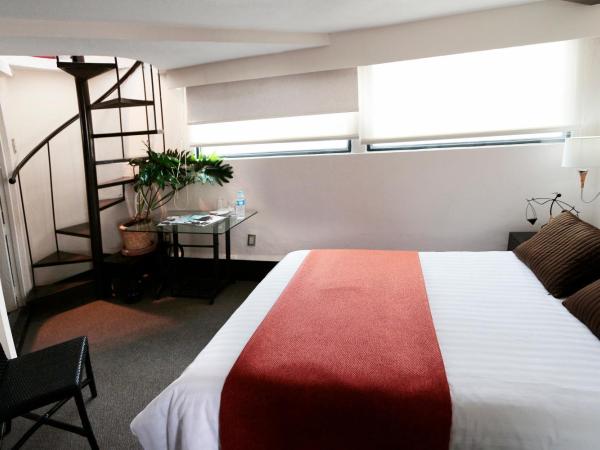 Aztic Hotel and Executive Suites : photo 3 de la chambre chambre double avec 2 lits doubles