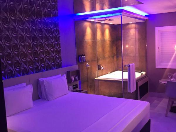Fantasy Motel : photo 4 de la chambre suite lit king-size avec baignoire spa