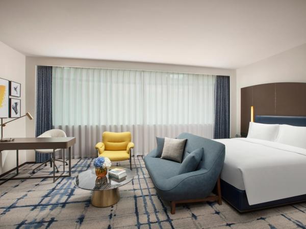 voco Wuhan Xinhua, an IHG Hotel : photo 5 de la chambre suite lit king-size - accès au salon