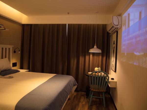 银座精宿(黄岛金沙滩香江路商业街店) : photo 2 de la chambre superior double room with audio 