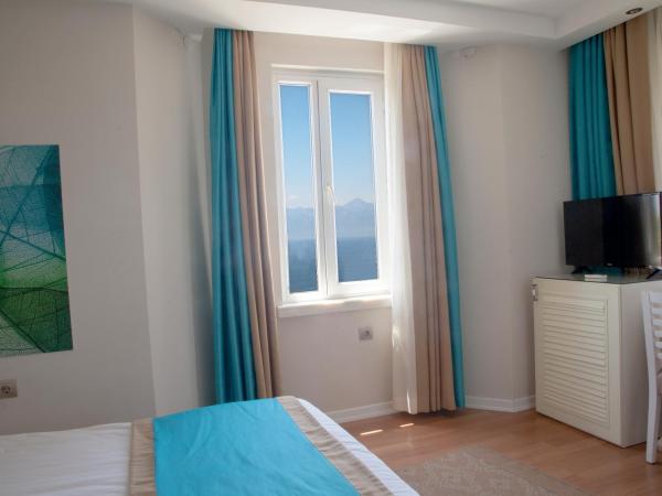 Nasa Flora Hotel : photo 9 de la chambre chambre double ou lits jumeaux standard - vue sur mer