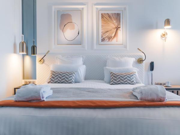 Hôtel D'Anjou : photo 6 de la chambre chambre triple deluxe avec climatisation