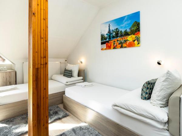 Dobó Vendégház : photo 2 de la chambre chambre quadruple