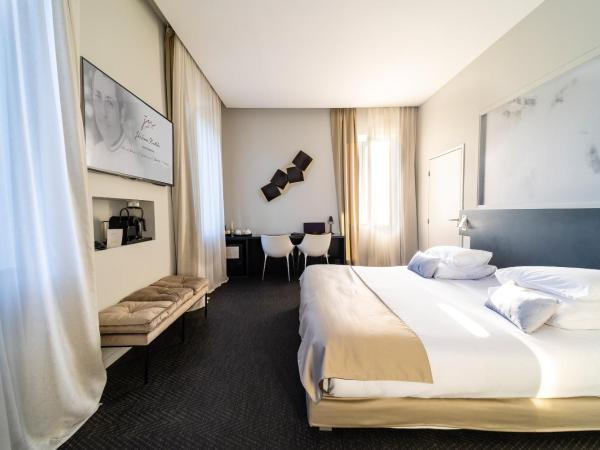 Mas de Boudan : photo 3 de la chambre suite - vue sur jardin