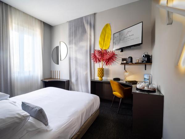 Mas de Boudan : photo 2 de la chambre chambre lits jumeaux deluxe