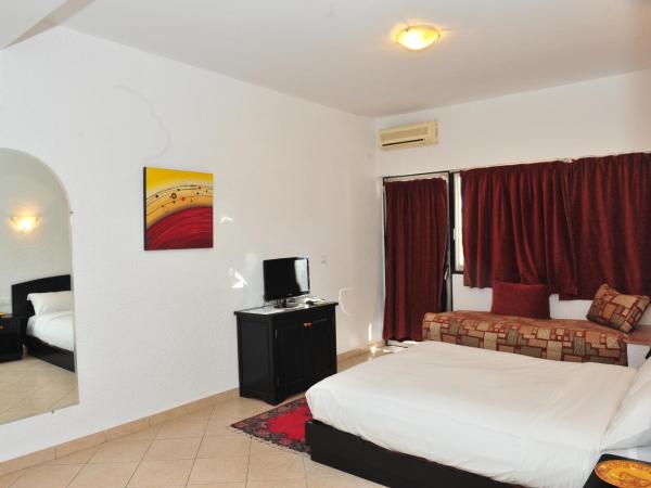Studiotel Afoud : photo 1 de la chambre chambre triple