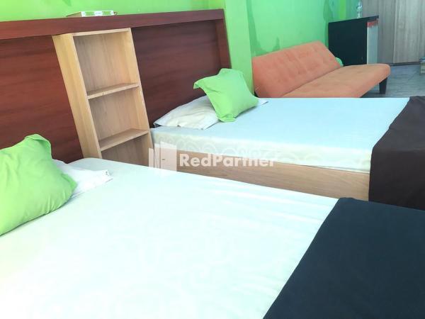 Seungit Syariah Inn Tebet Mitra RedDoorz : photo 2 de la chambre chambre lits jumeaux deluxe