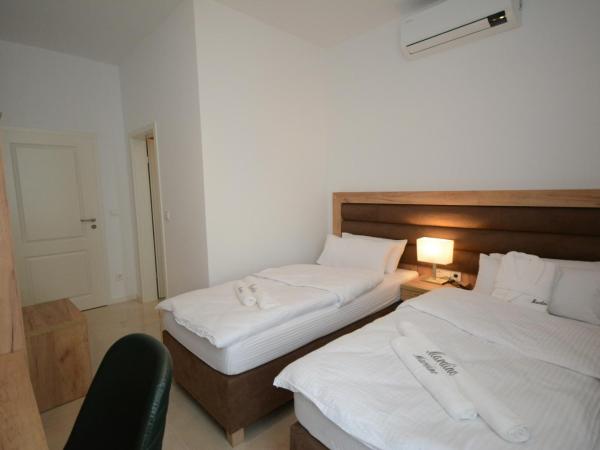 Hannover Zimmervermietung Mardino : photo 4 de la chambre chambre double ou lits jumeaux avec douche