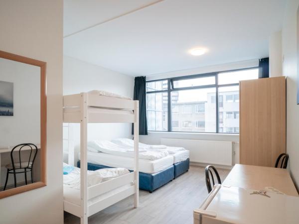 Guesthouse Pavi : photo 1 de la chambre chambre quadruple avec salle de bains privative