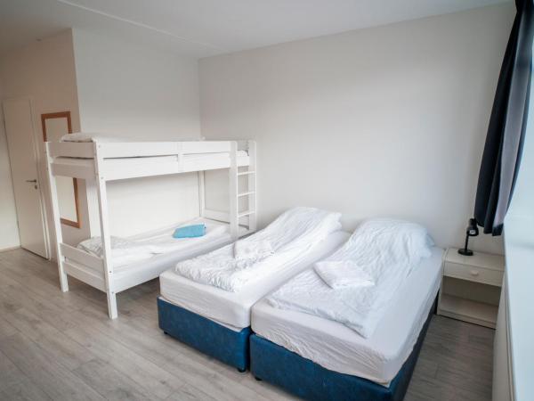 Guesthouse Pavi : photo 3 de la chambre chambre quadruple avec salle de bains privative