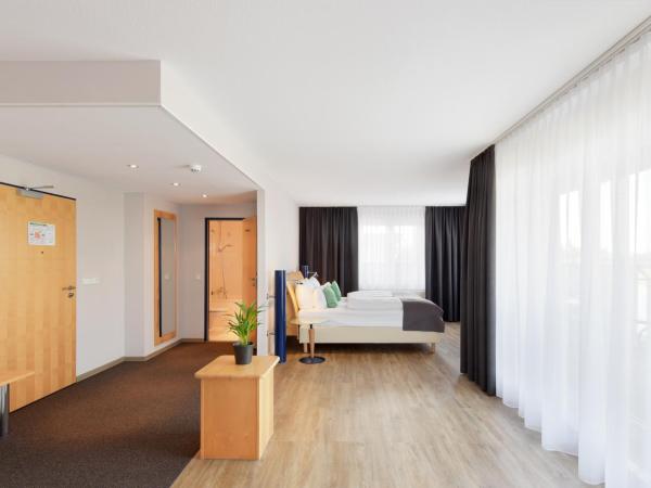 Amedia Dresden Elbpromenade, Trademark Collection by Wyndham : photo 6 de la chambre suite