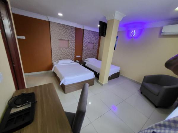 Poorna Hotel : photo 4 de la chambre chambre lits jumeaux supérieure