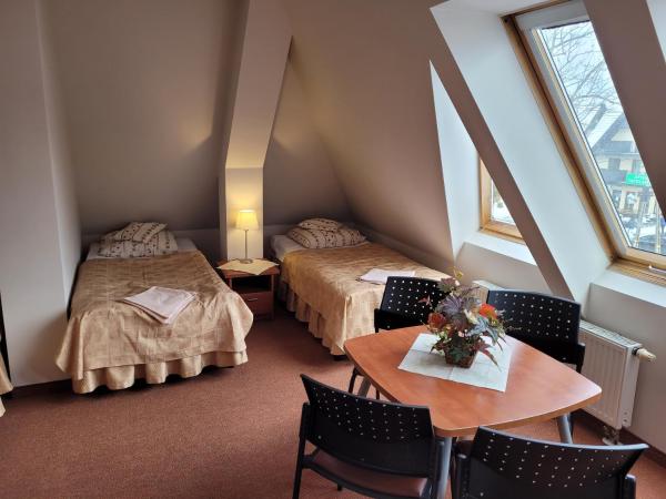 Willa Ostoja u Pyrca : photo 5 de la chambre chambre quadruple