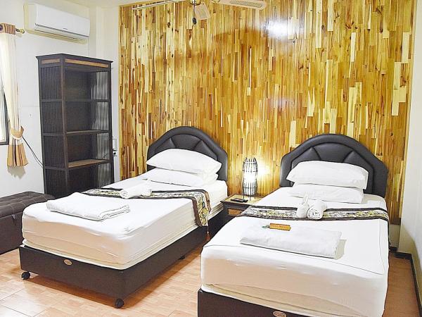 Homestay Chiangrai : photo 4 de la chambre chambre lits jumeaux avec salle de bains privative spare