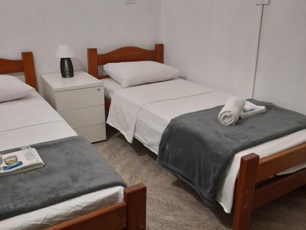 LÍAH Hostel & Suites : photo 8 de la chambre chambre lits jumeaux Économique