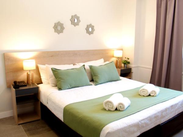 Soltigua Apart Hotel Mendoza : photo 5 de la chambre appartement 1 chambre (4 adultes)