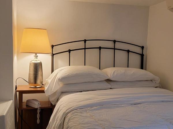 Incentra Village Hotel : photo 10 de la chambre studio Évêque avec grand lit et kitchenette