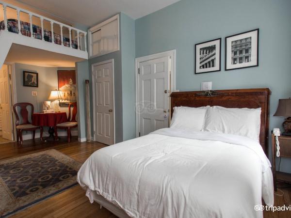 Incentra Village Hotel : photo 1 de la chambre studio washington avec grand lit et kitchenette