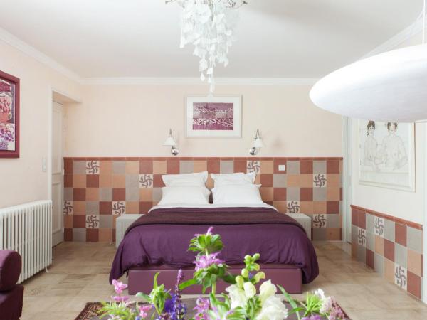 Chambres d'Hôtes Eden Ouest : photo 1 de la chambre suite mauve avec hammam privé