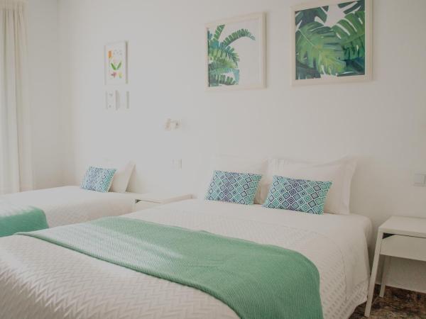 Residencial Avenida : photo 2 de la chambre chambre triple supérieure