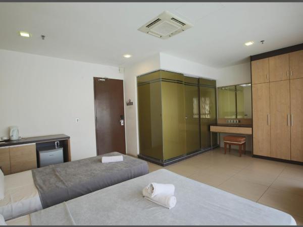 T Hotel Jalan Tar : photo 6 de la chambre chambre triple deluxe