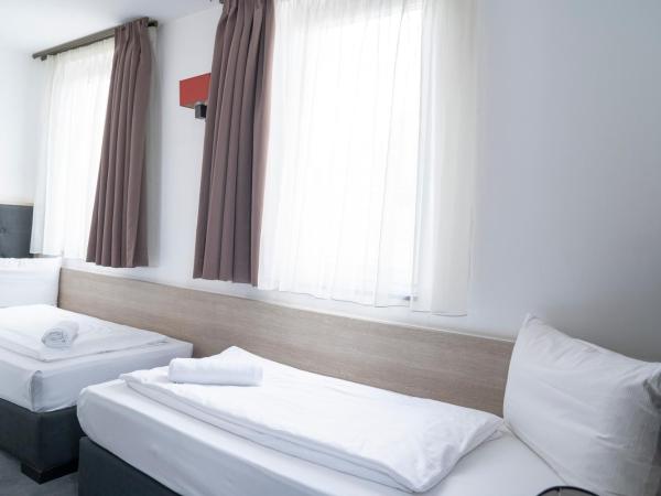 Alpha & Omega Hotel : photo 7 de la chambre chambre lits jumeaux