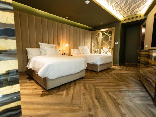 L Hotel Perla Boutique : photo 2 de la chambre chambre lits jumeaux avec balcon