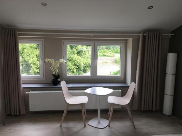 Le Jardin du Thé Bord de la Meuse : photo 2 de la chambre chambre triple