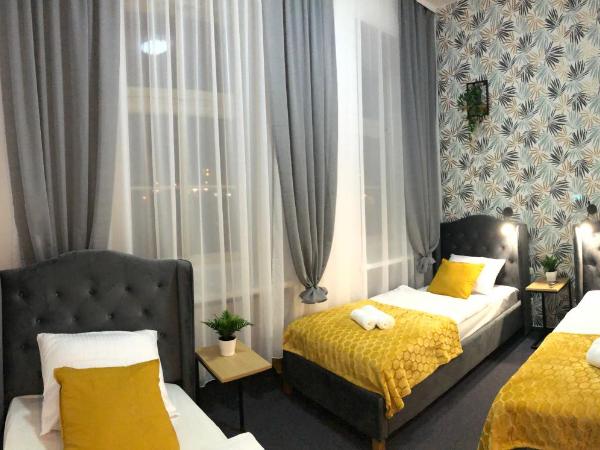 Great Polonia Wrocław Tumski : photo 1 de la chambre chambre triple classique