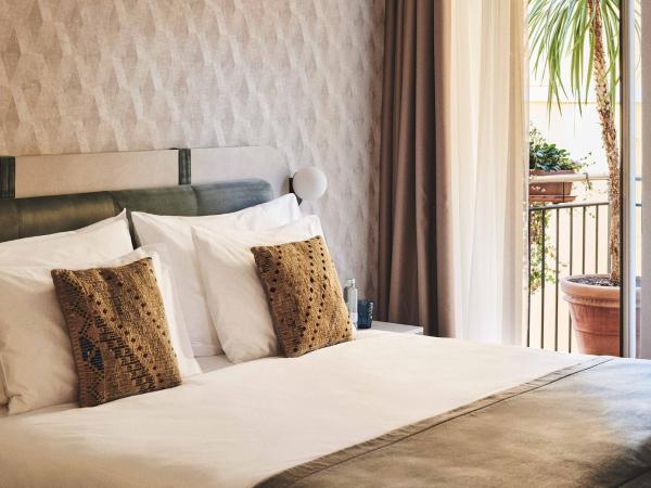 Vista Lakefront Boutique Hotel : photo 2 de la chambre chambre double lit king-size jardin