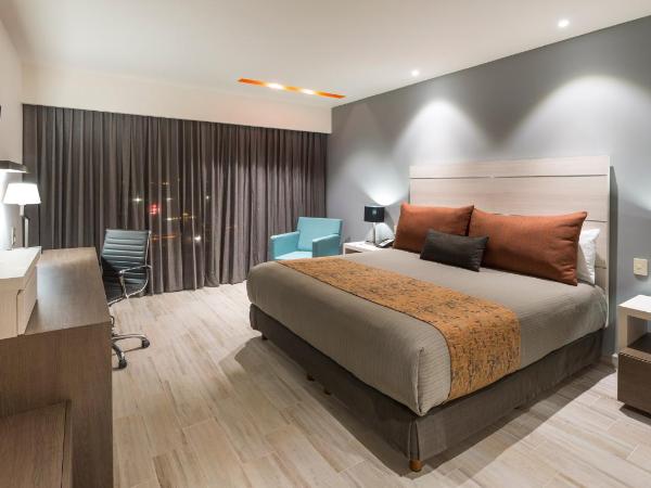 Real Inn Perinorte : photo 4 de la chambre chambre lit king-size de luxe 