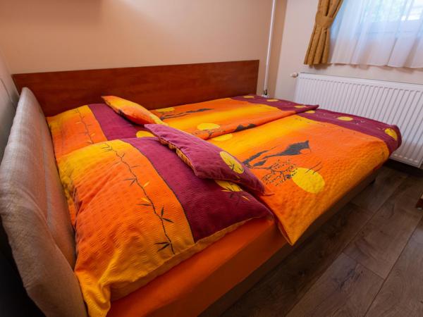 Erika Vendégház : photo 2 de la chambre chambre triple deluxe