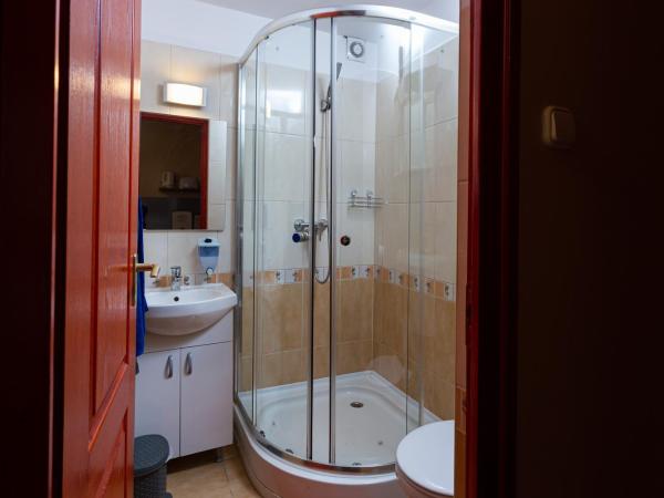 Erika Vendégház : photo 9 de la chambre chambre triple deluxe