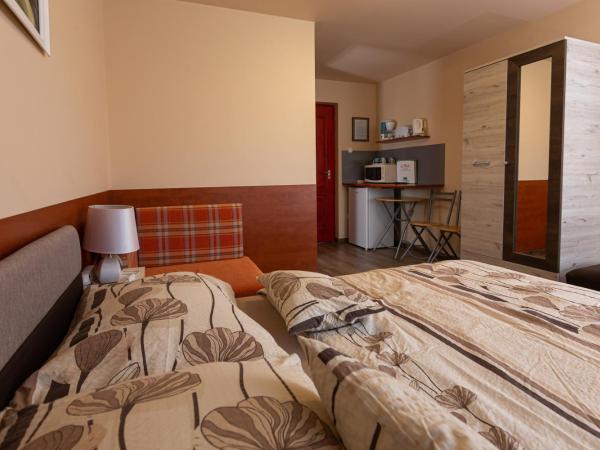 Erika Vendégház : photo 9 de la chambre chambre triple