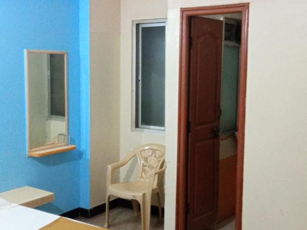 SRI VIJAYA PALACE LODGING : photo 3 de la chambre chambre lit king-size deluxe