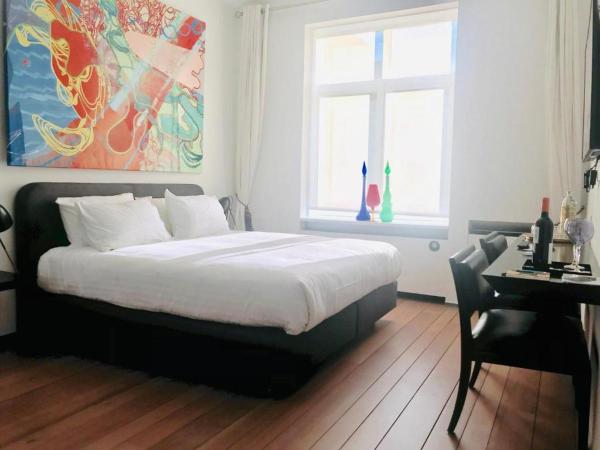 Les Lofts d'Artistes : photo 1 de la chambre chambre double avec salle de bains privative