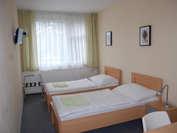 Pension Milk Inn : photo 3 de la chambre chambre lits jumeaux