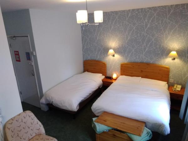 River Hotel : photo 1 de la chambre chambre familiale standard avec salle de bains privative