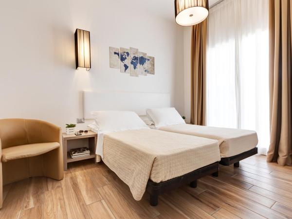 Hotel Nettuno : photo 4 de la chambre chambre familiale supérieure