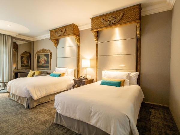 Quinta Real Monterrey : photo 4 de la chambre hébergement gran clase avec 2 lits