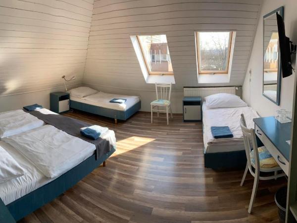 Joker Panzió : photo 1 de la chambre chambre triple